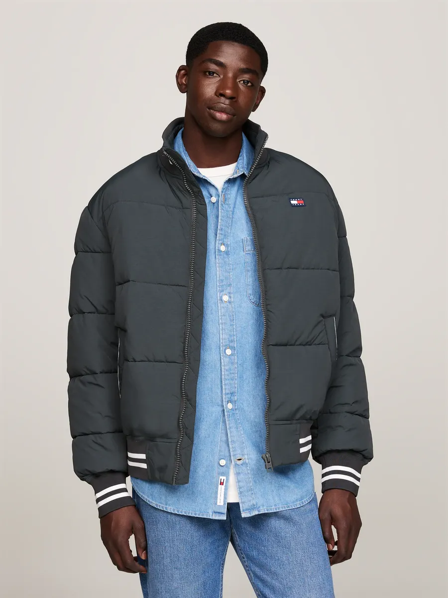 

Блузон Tommy Jeans "TJM VARSITY TRANSITIONAL PUFFER", цвет New Charcoal