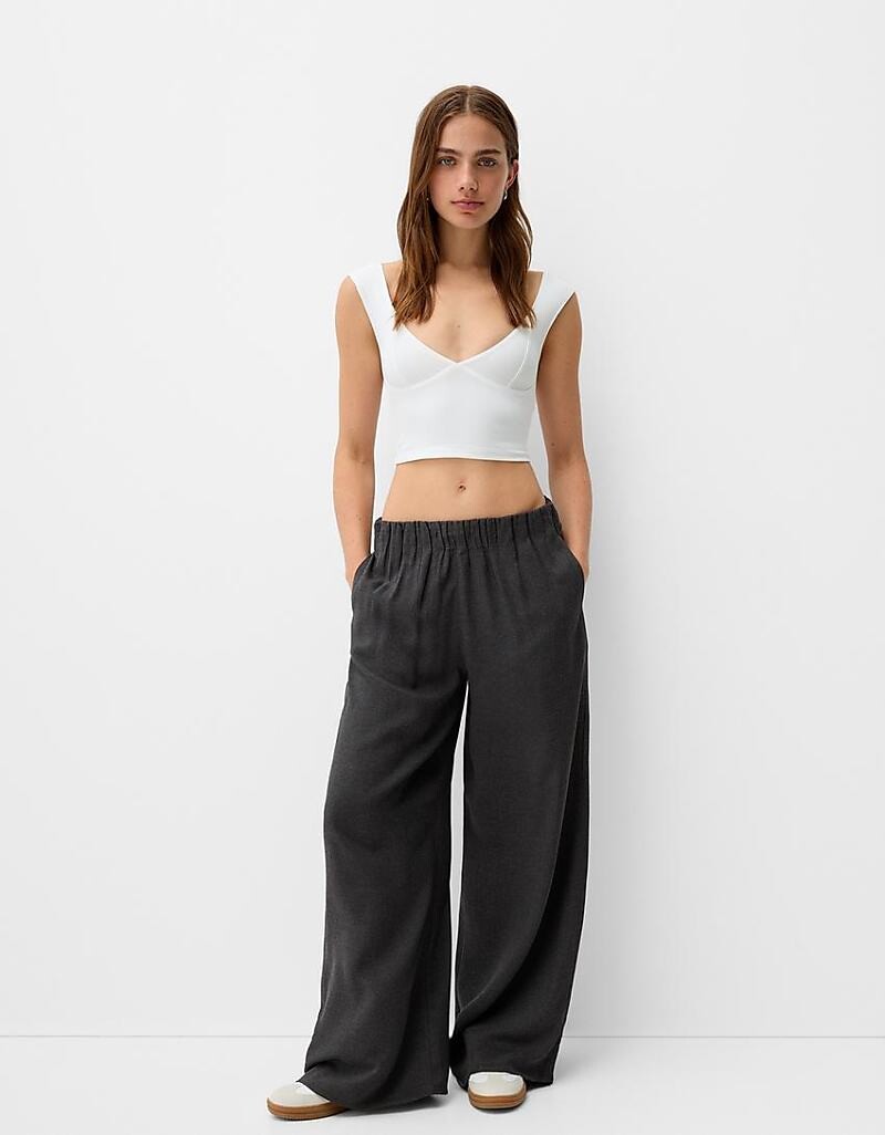

Темно-серые широкие брюки без застежки Bershka