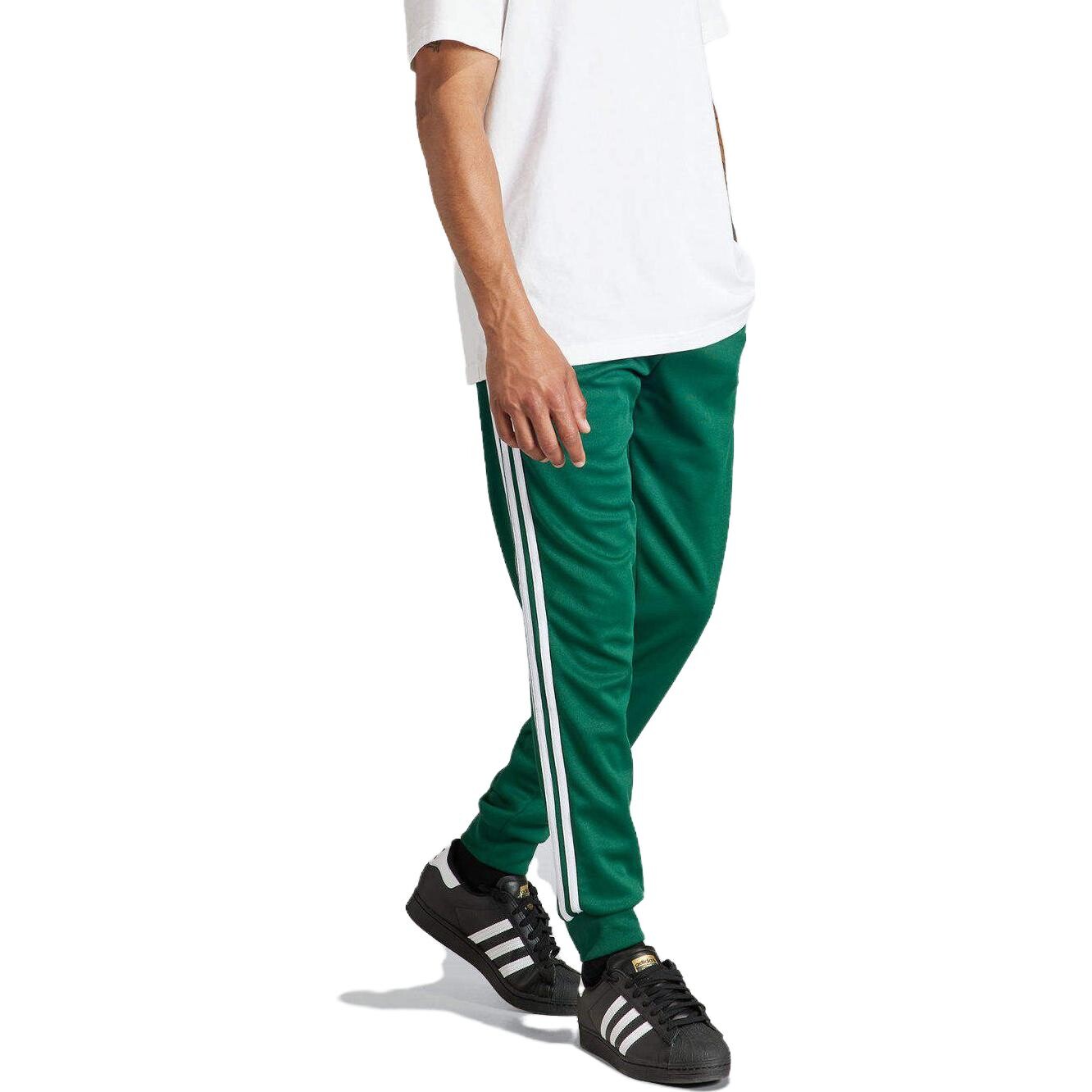 Трикотажные спортивные штаны Adicolor унисекс зеленые Adidas Originals, зеленый — фото 2