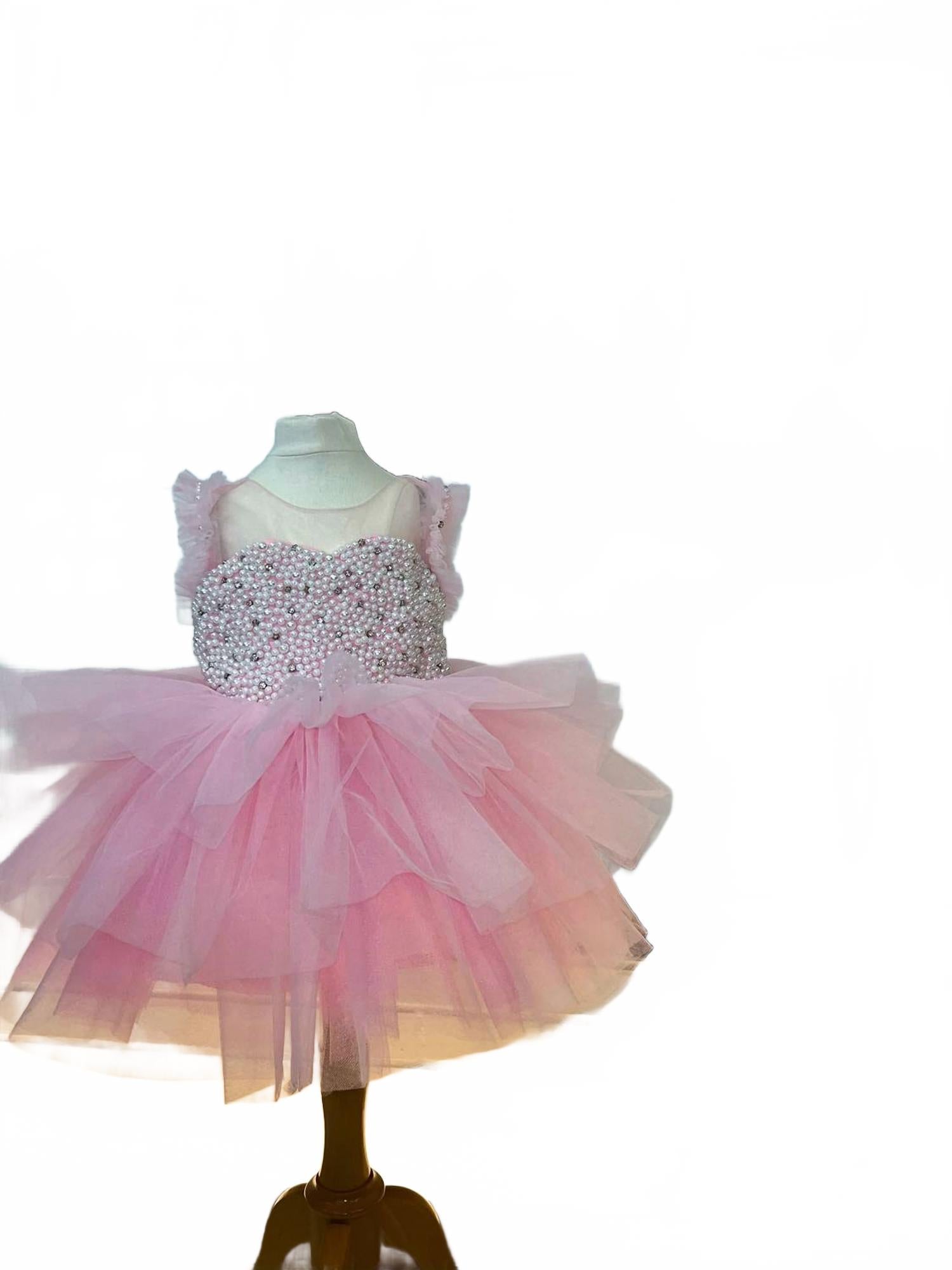 

Иллюзия девушки с юбкой из тюля, разбросанной в розовом Eda Baby, розовый