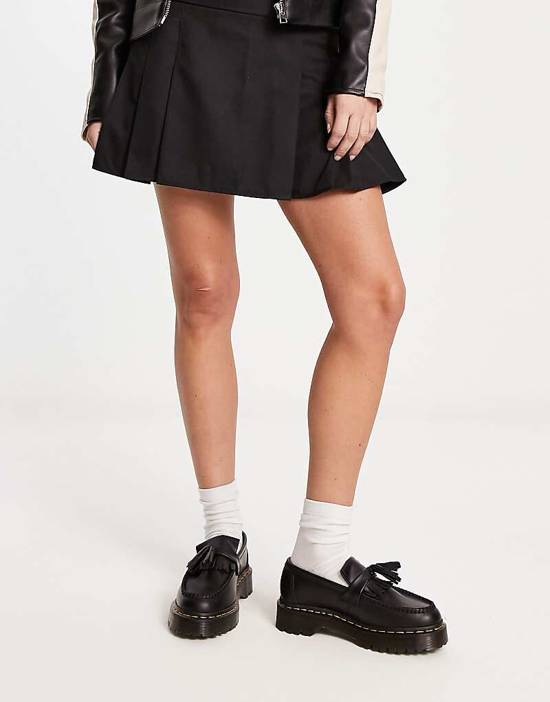 

Черные лоферы на четырех платформе Dr Martens Adrian