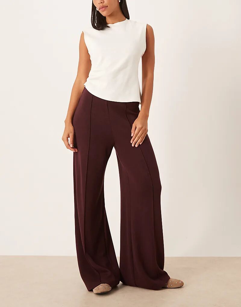 

Трикотажные брюки Mango со швом спереди бордового цвета