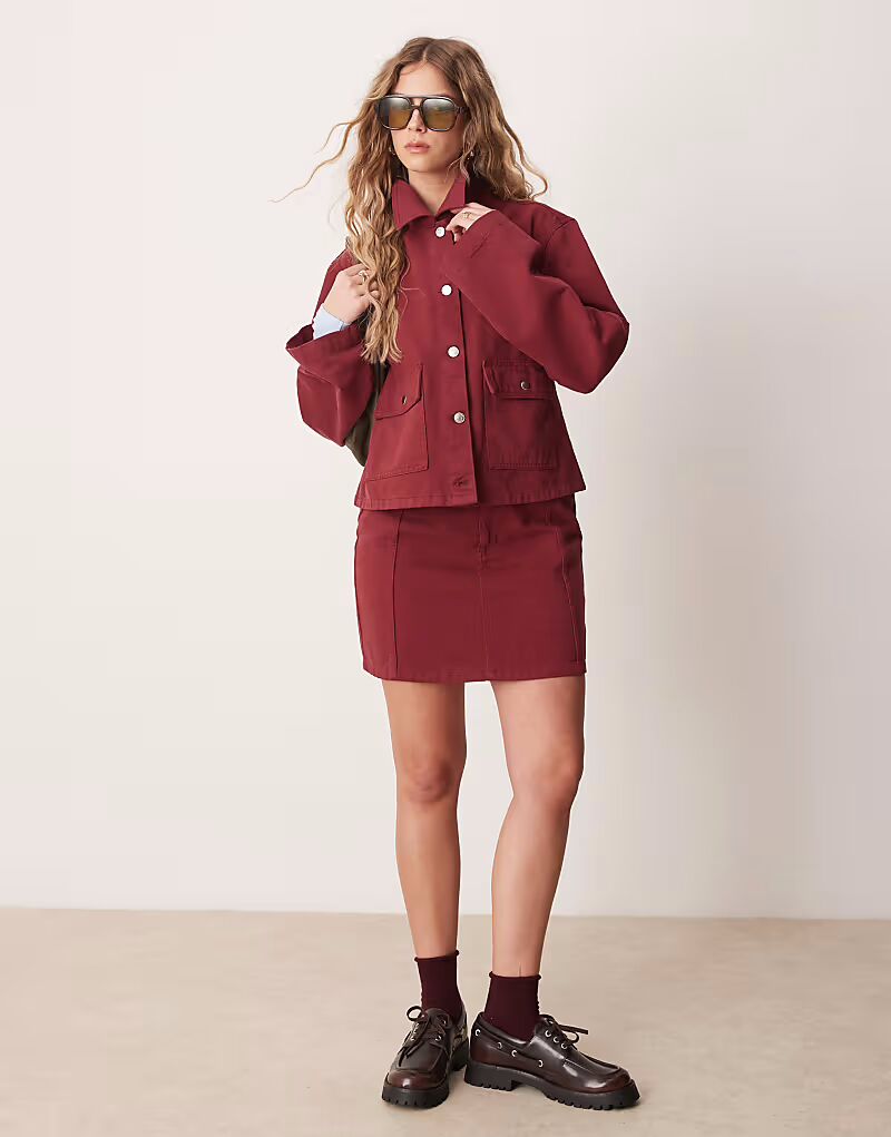 

Мини-юбка из денима со швами гранатового цвета Asos Design