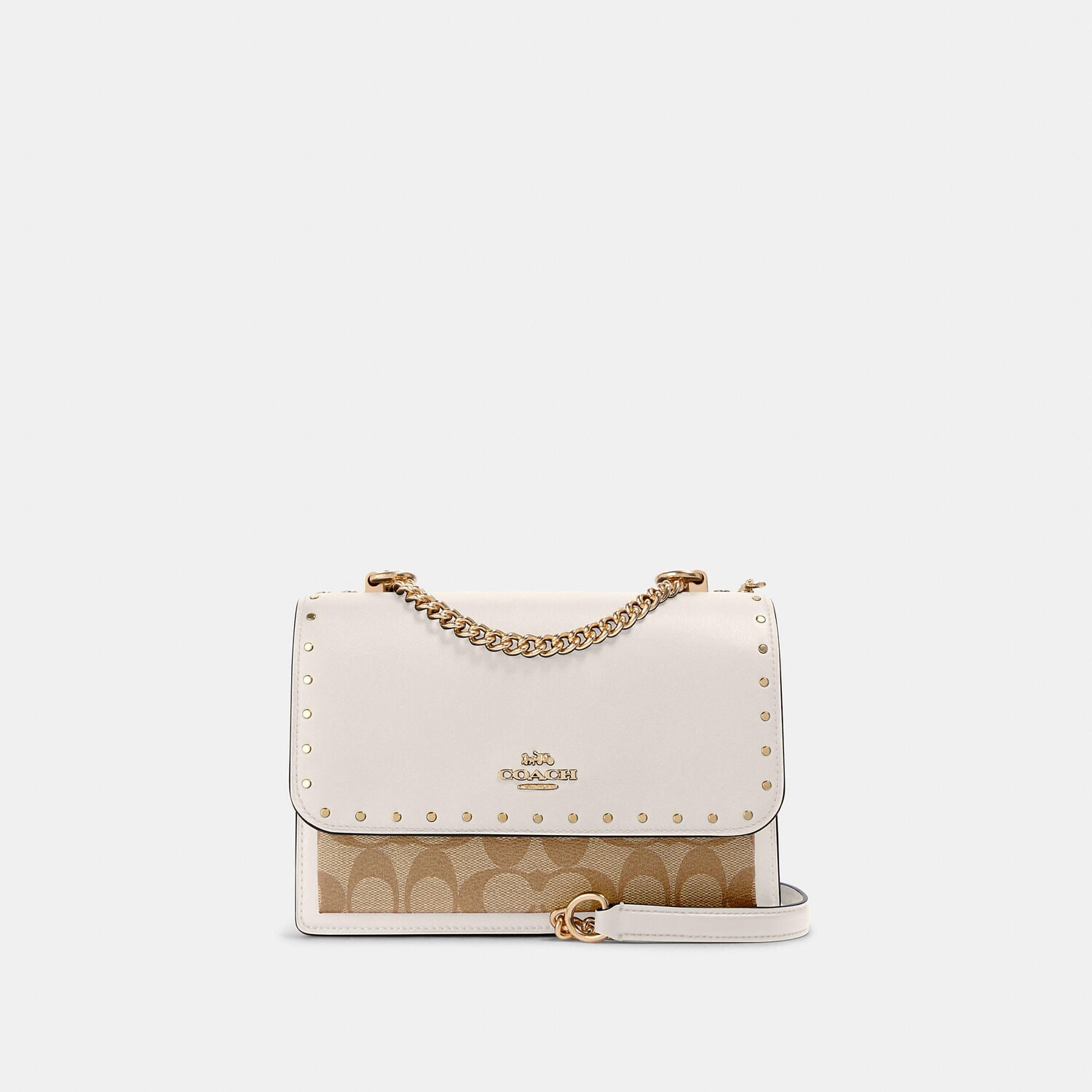 

Сумка через плечо Coach Outlet Klare из фирменной парусины с заклепками, цвет Gold/Light Khaki Multi