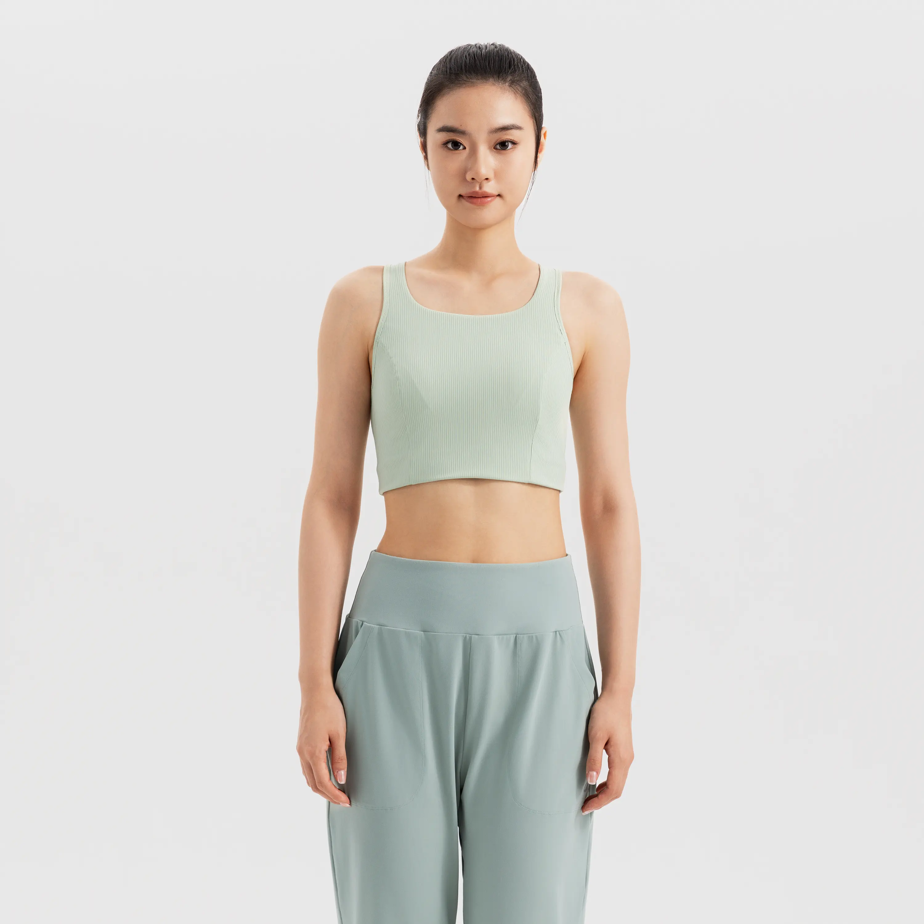 

Женская удлинённая спортивная майка Decathlon для средних нагрузок с открытой спиной