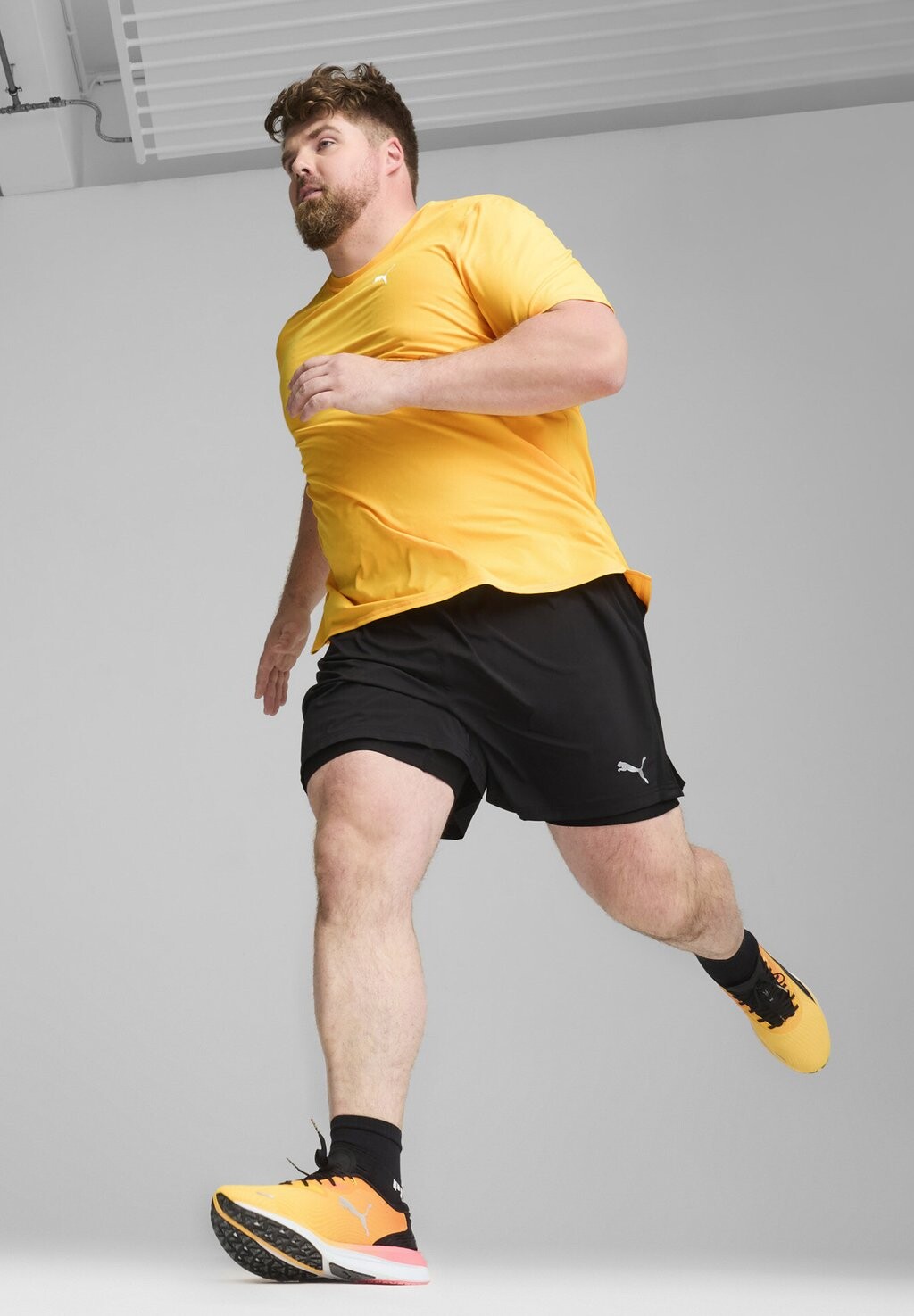 

Спортивная футболка Run Cloudspun Tee Puma, солнечный поток