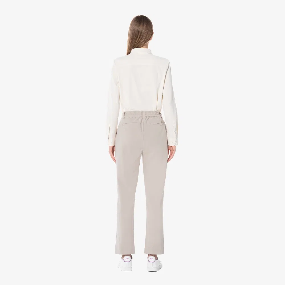 Слаксы женские Lacoste, утепленные, на резинке, кремовые — фото 4