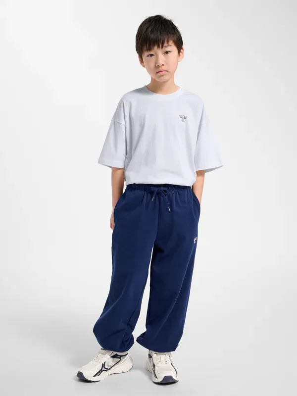 Спортивные штаны Hummel Hmljr jump boxy elastic tracksuit bottoms, средневековый синий
