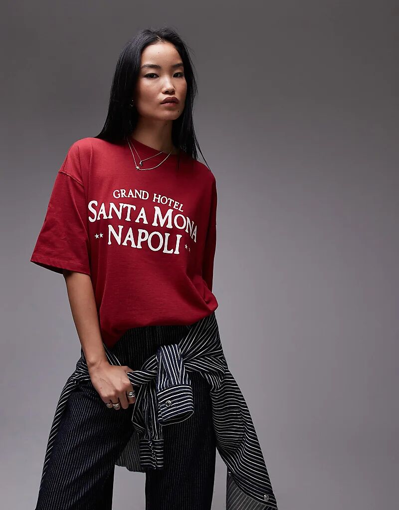 

Футболка свободного кроя с графическим принтом Santa Mona Napoli красного цвета Topshop