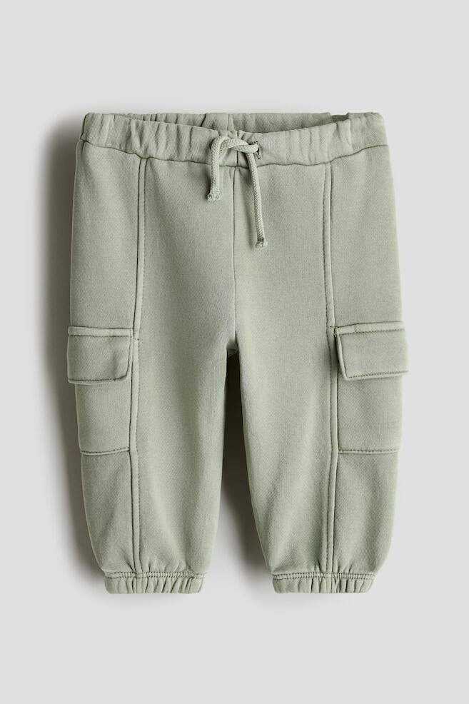 

Спортивные брюки карго в застиранном виде H&M, зеленый