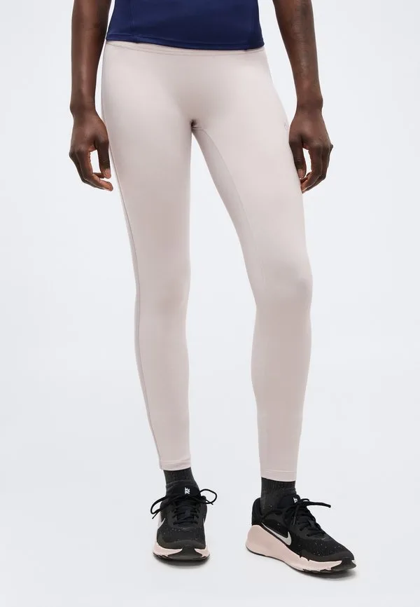 Одни обтягивающие леггинсы Nike Performance, Platinum Violet