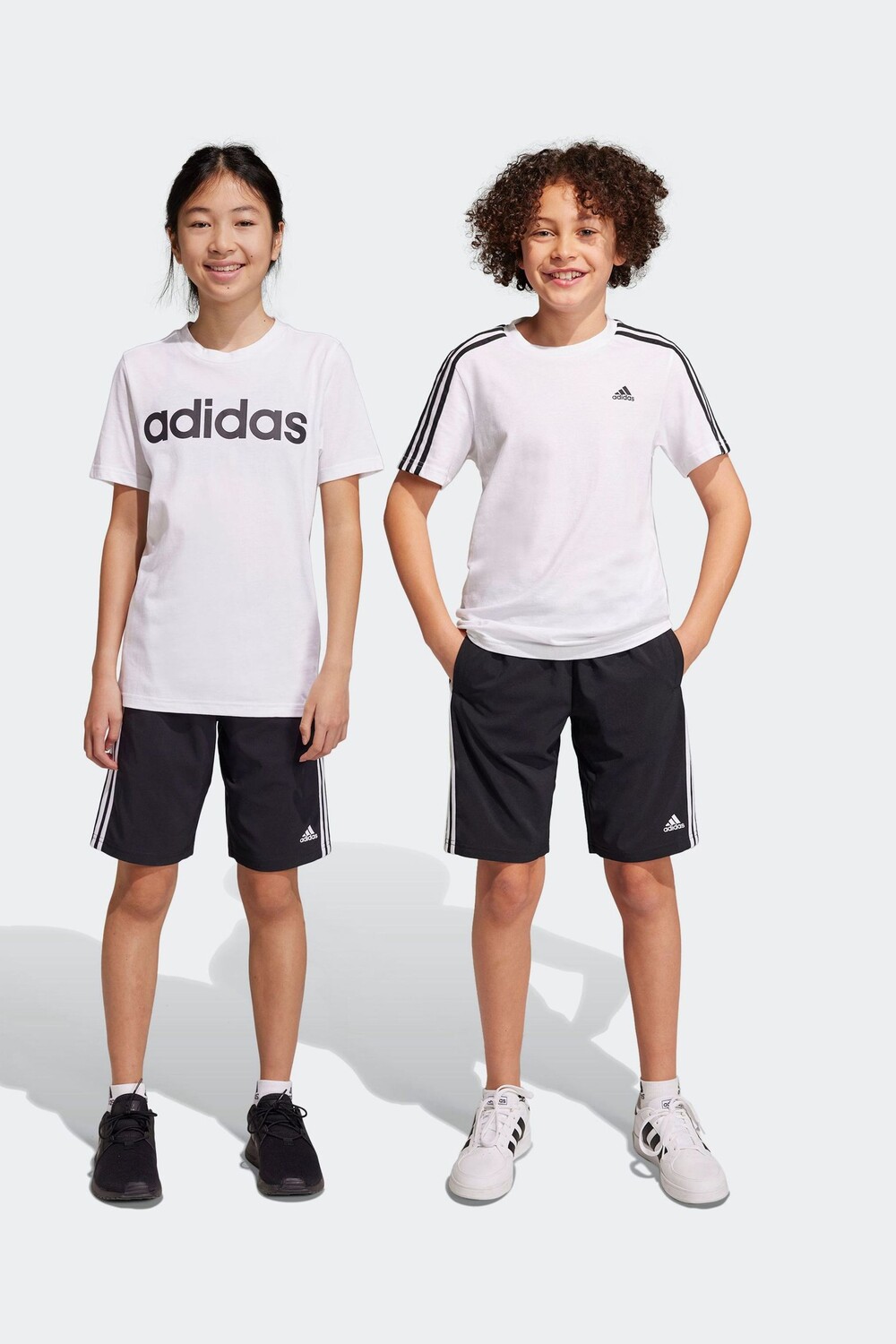 

Тканые шорты Essentials с тремя полосками Adidas, черный