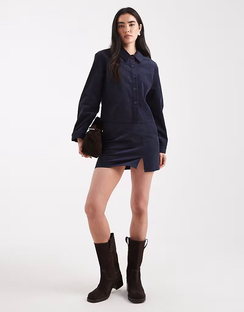 

Мини-юбка из вельвета с разрезом спереди темно-синего цвета Asos Design