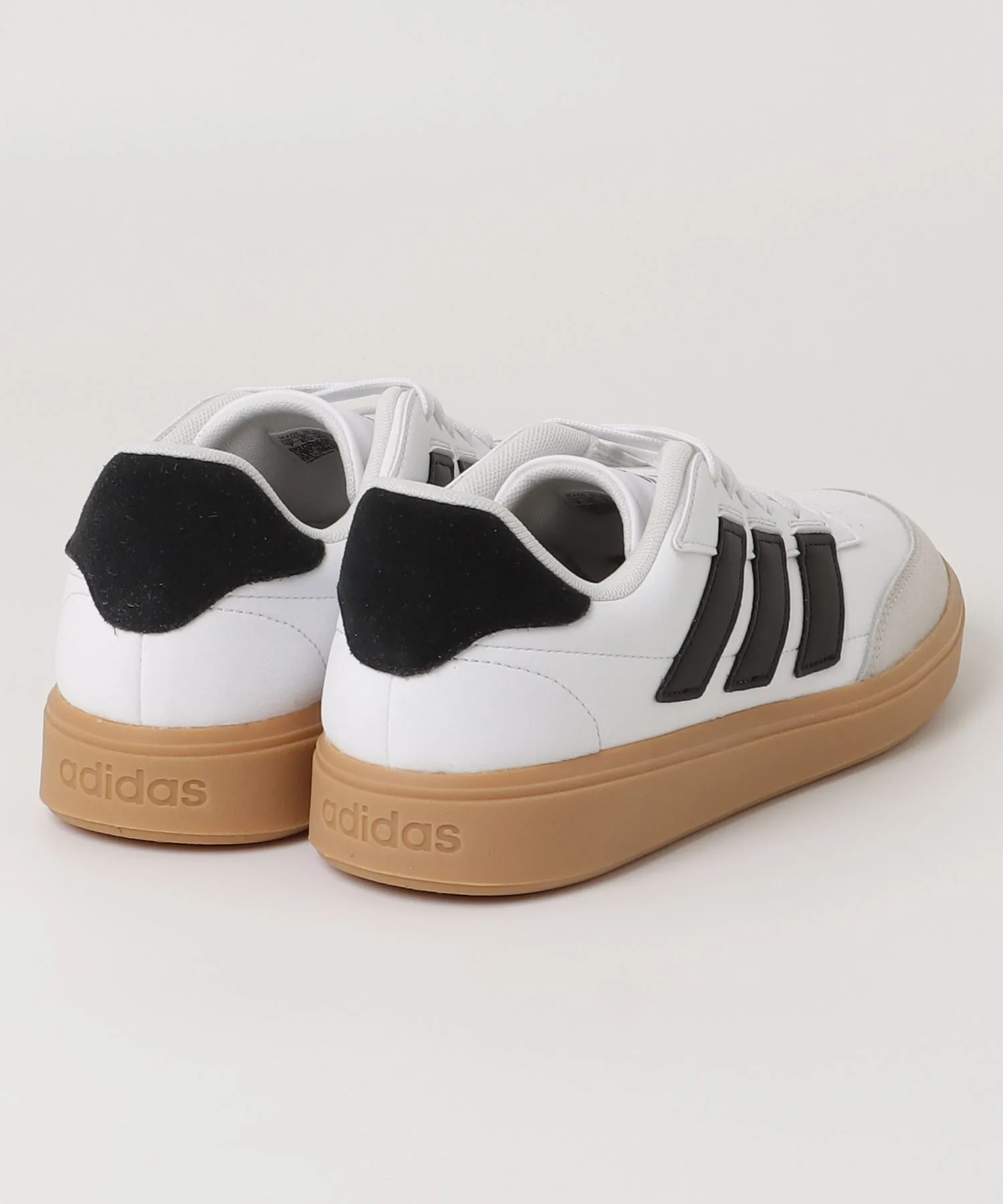 Мужские кроссовки из синтетической кожи adidas Courtblock бело-черные — фото 2