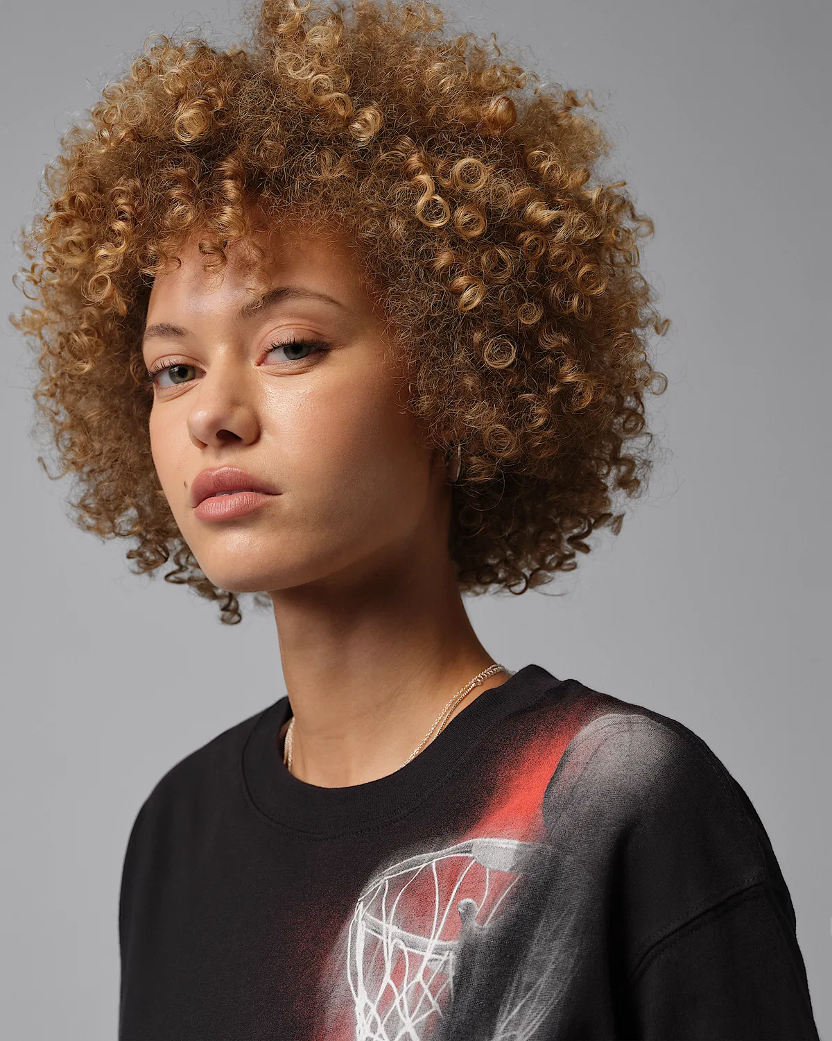 Женская футболка Dri-FIT с принтом Jordan Sport Heritage, Black/Infrared 23 — фото 3