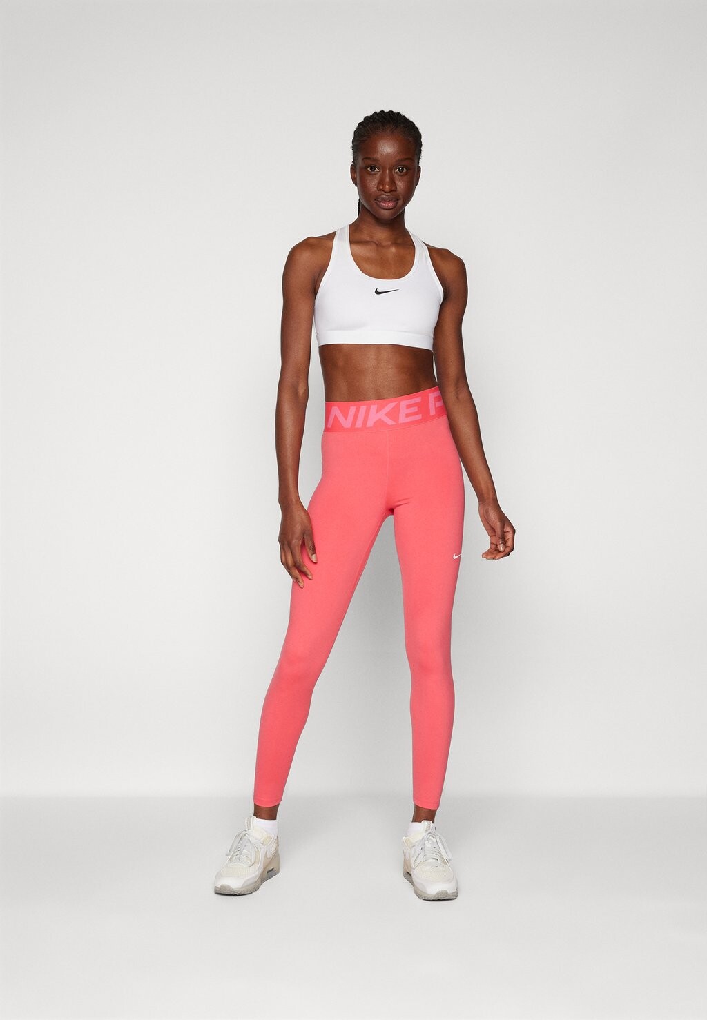 

Тайтсы SCULPT Nike, розовый