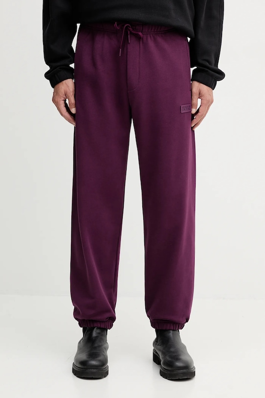 

Хлопковые спортивные штаны Versace Jeans Couture, фиолетовый