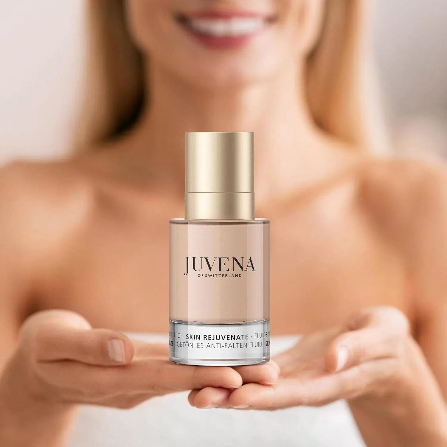 Тонирующий антивозрастной флюид Juvena Skin Rejuvenate Delining с SPF 10 50 мл Juvena — фото 2