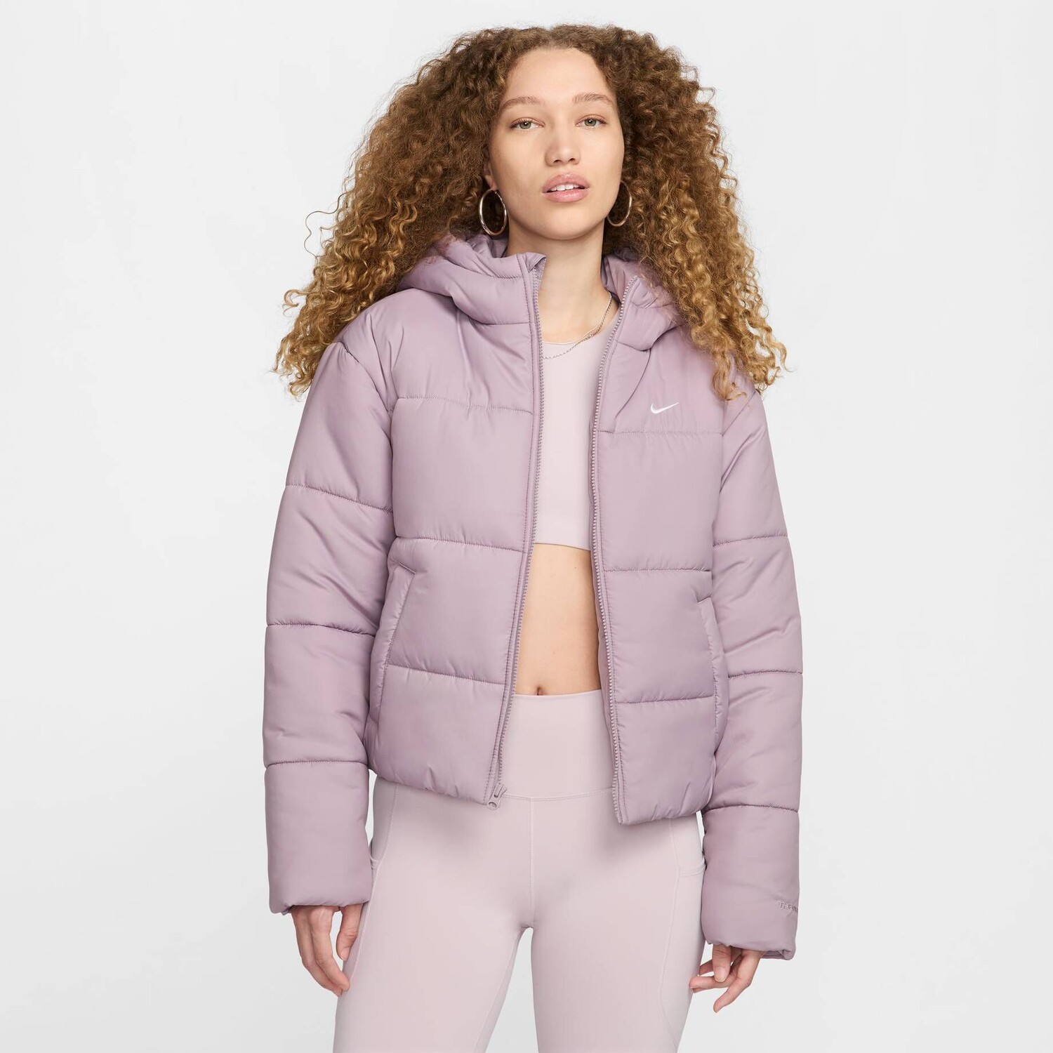 

Стеганая куртка с капюшоном Nike Sportswear, фиолетовый