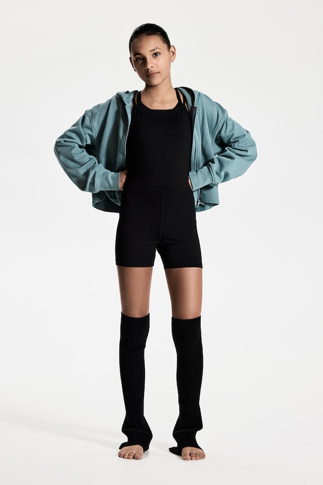 

Короткий спортивный комбинезон из материала DryMove H&M, черный