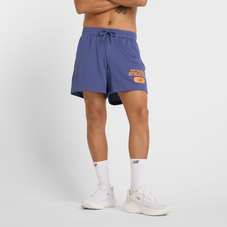 

Брюки свободного кроя new balance Heritage, индиго