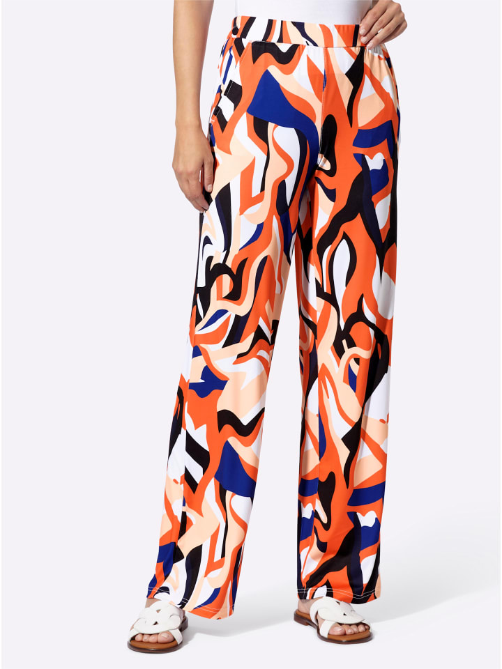 

Трикотажные брюки с принтом темно-синего и оранжевого цветов Heine