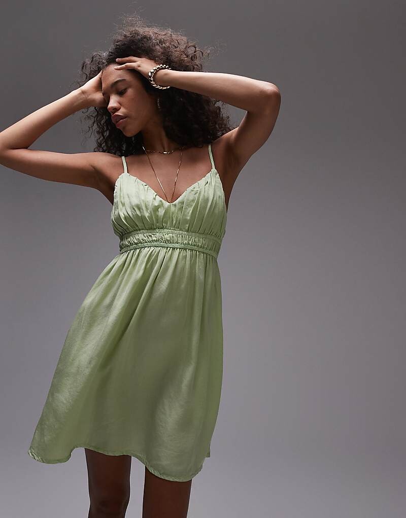 

Короткое зеленое платье Topshop со сборками