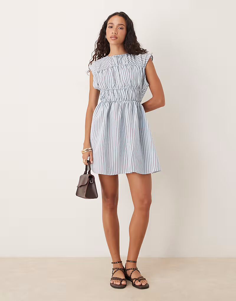 

Мини-платье с двойной юбкой и лифом в синюю полоску Asos Design