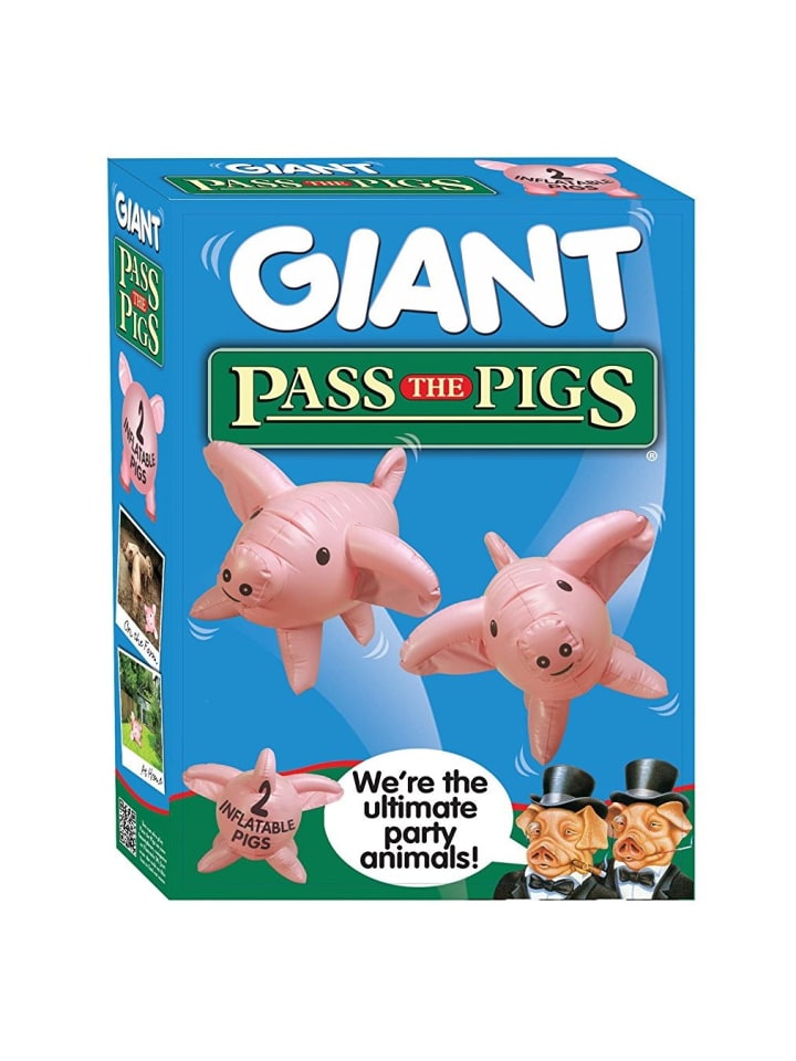 

Гигантская игра «Передай свиней» - красочный гигантский беспорядок