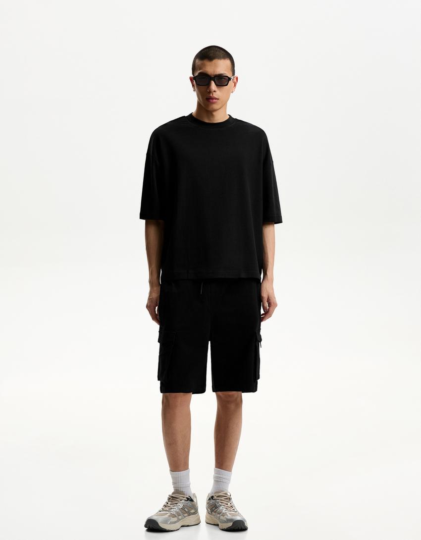 

Спортивные брюки-бермуды Cargo Bershka, черный