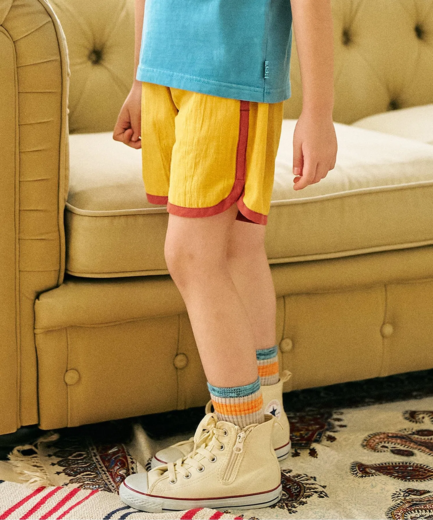 Детские шорты F.O.KIDS с окантовкой хлопковые жёлтые
