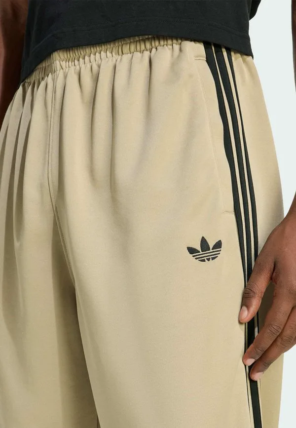 Свободные спортивные штаны из термобелья Adidas Originals, Stone Khaki Black — фото 4