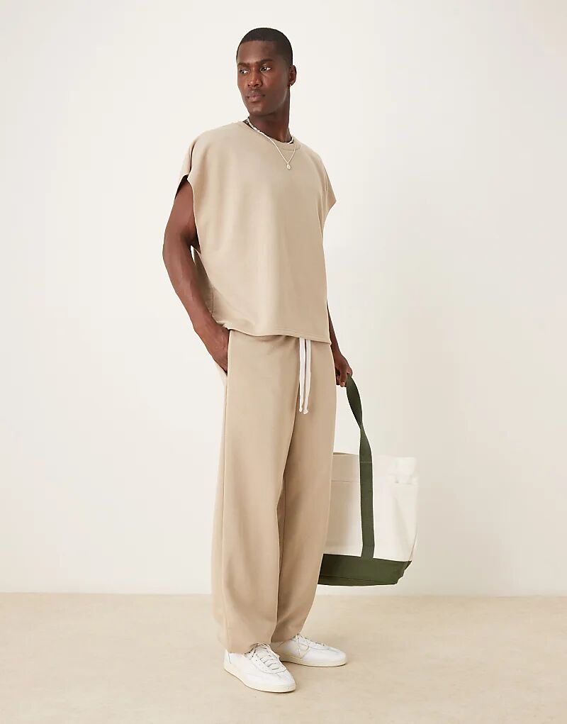 

Спортивные брюки свободного кроя с петлями сзади ASOS DESIGN бежевого цвета — часть комплекта