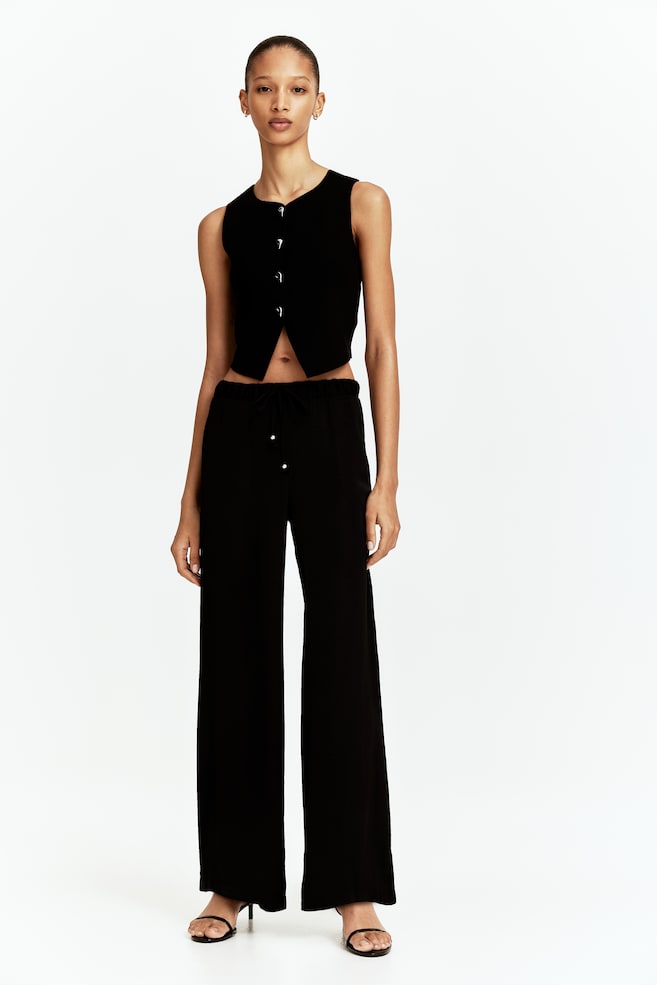 

Короткий трикотажный жилет H&M, черный