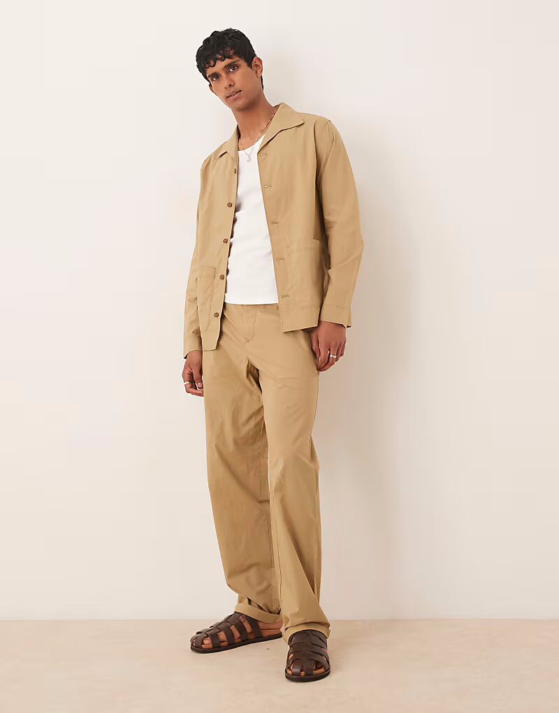 

Брюки свободного кроя прямого кроя бежевого цвета Mango