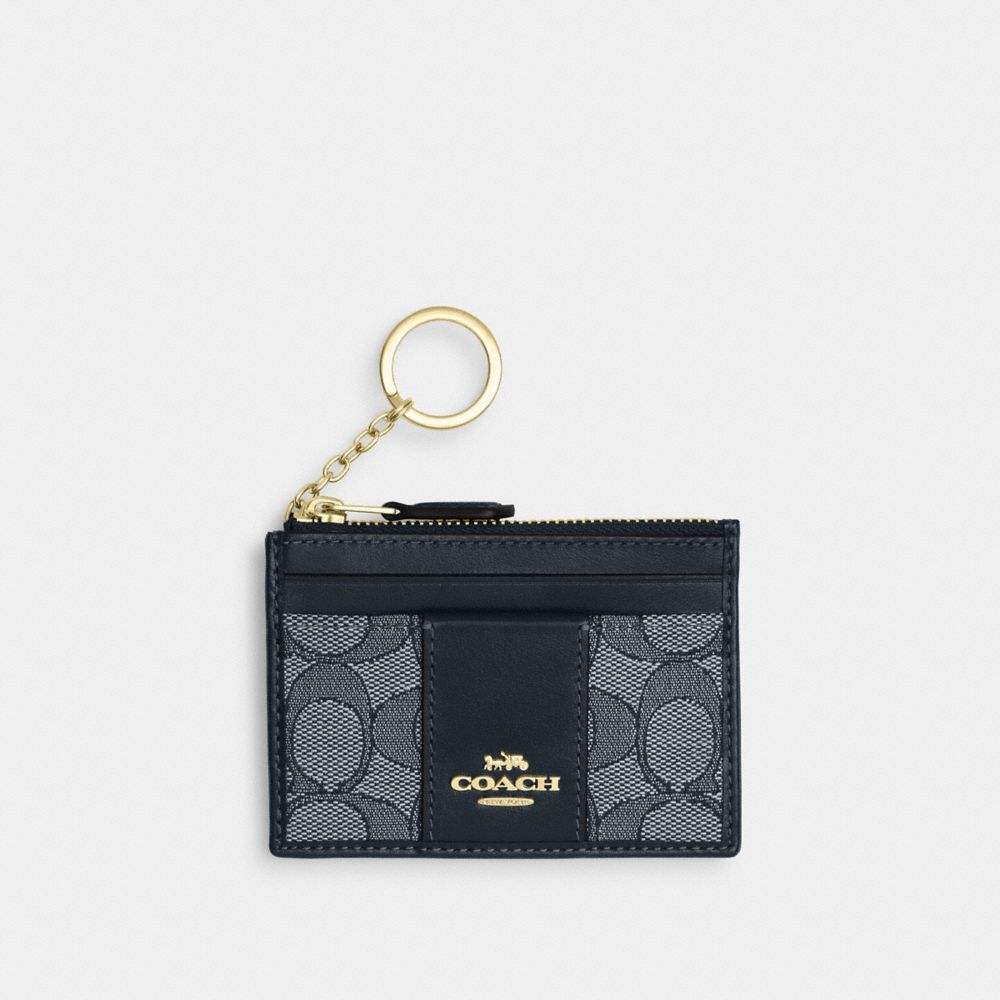 

Кошелек Coach Mini Id Skinny, цвет Gold/Navy/Midnight Navy