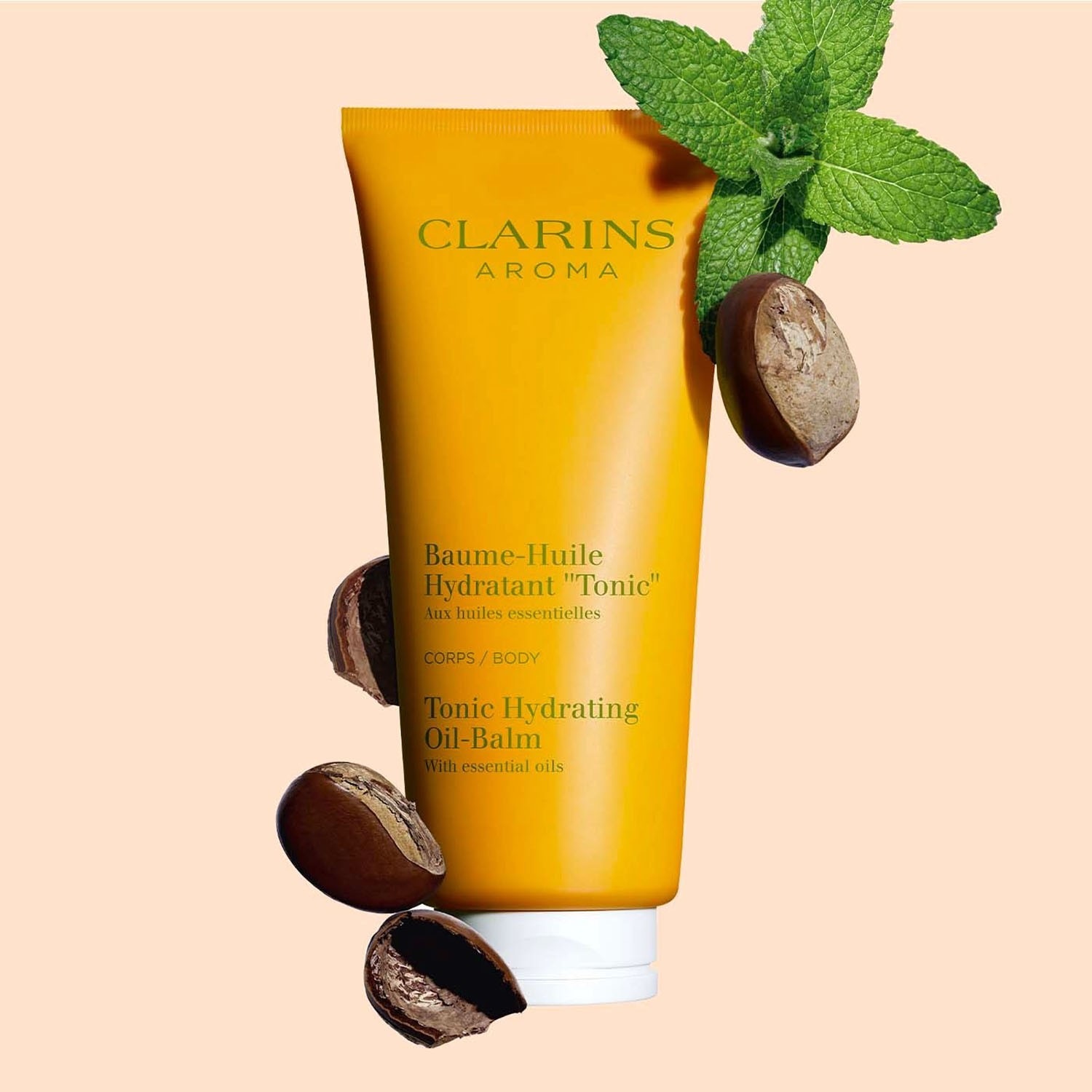 Масло для тела aromaphytocare baume-huile hydratant tonic Clarins, объем 200 мл — фото 2