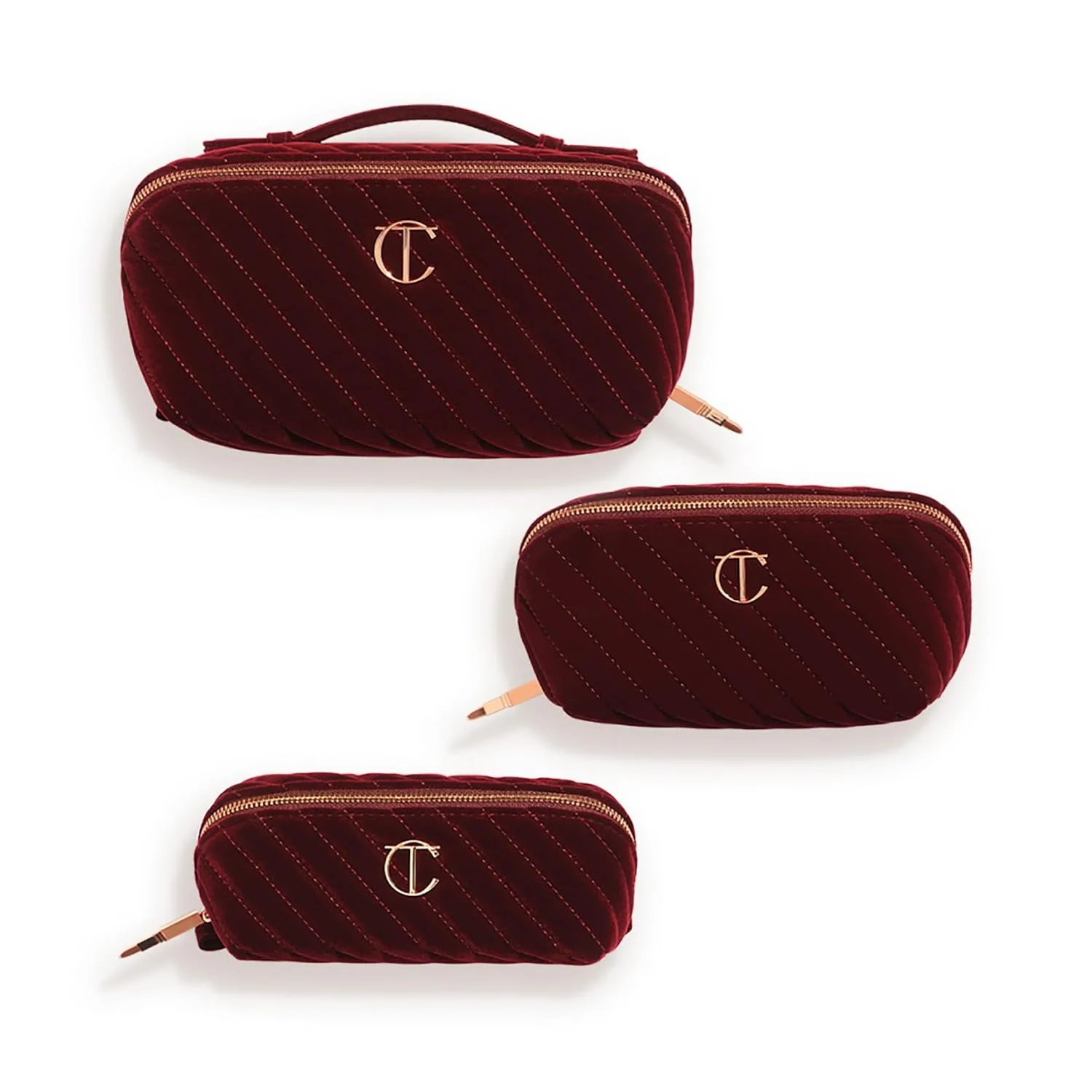 Charlotte Tilbury Travel Makeup Bag of My Dreams - стеганый вельветовый органайзер для ухода, парфюмерии и косметики с 5 отделениями, карманом на молнии и верхней ручкой - культовая косметичка Night Crimson Мини, Night Crimson — фото 4