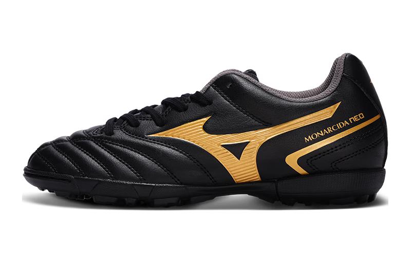 

Износостойкие детские футбольные бутсы низкие черные золотые Mizuno
