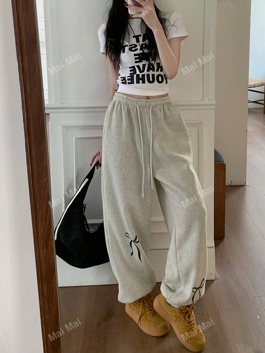 

Спортивные брюки с кулиской на талии и принтом с бантом, серый