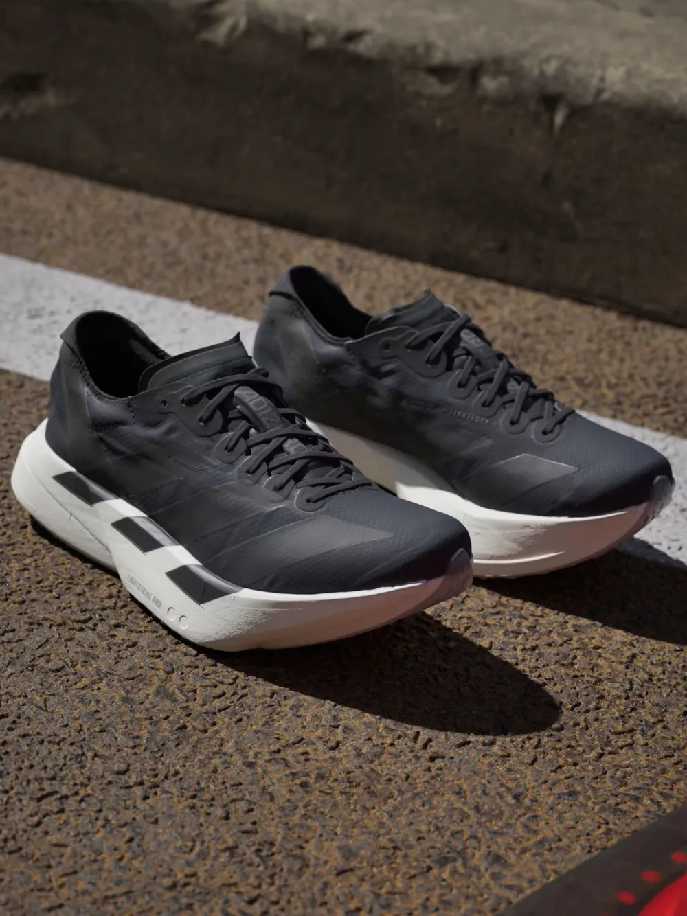 Кроссовки Adizero Adios Pro 4 Adidas, черный — фото 2