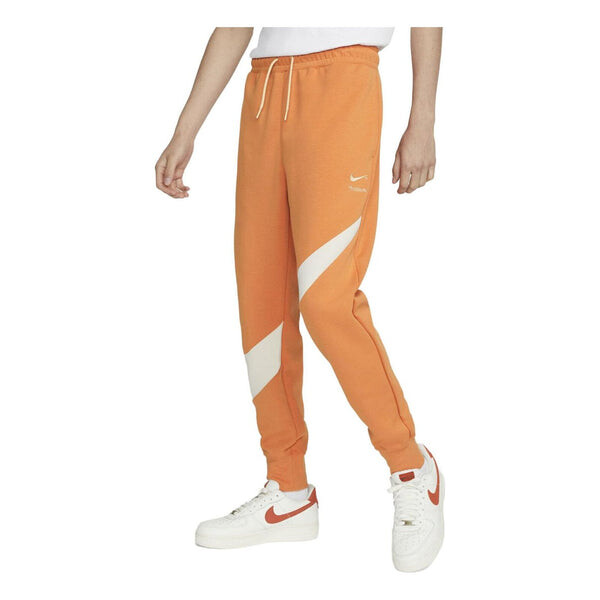 

Брюки sportswear swoosh tech fleece sweatpants 'hot curry' Nike, мультиколор