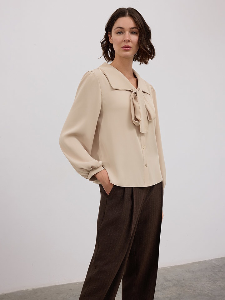 

Блузка песочного цвета BGN