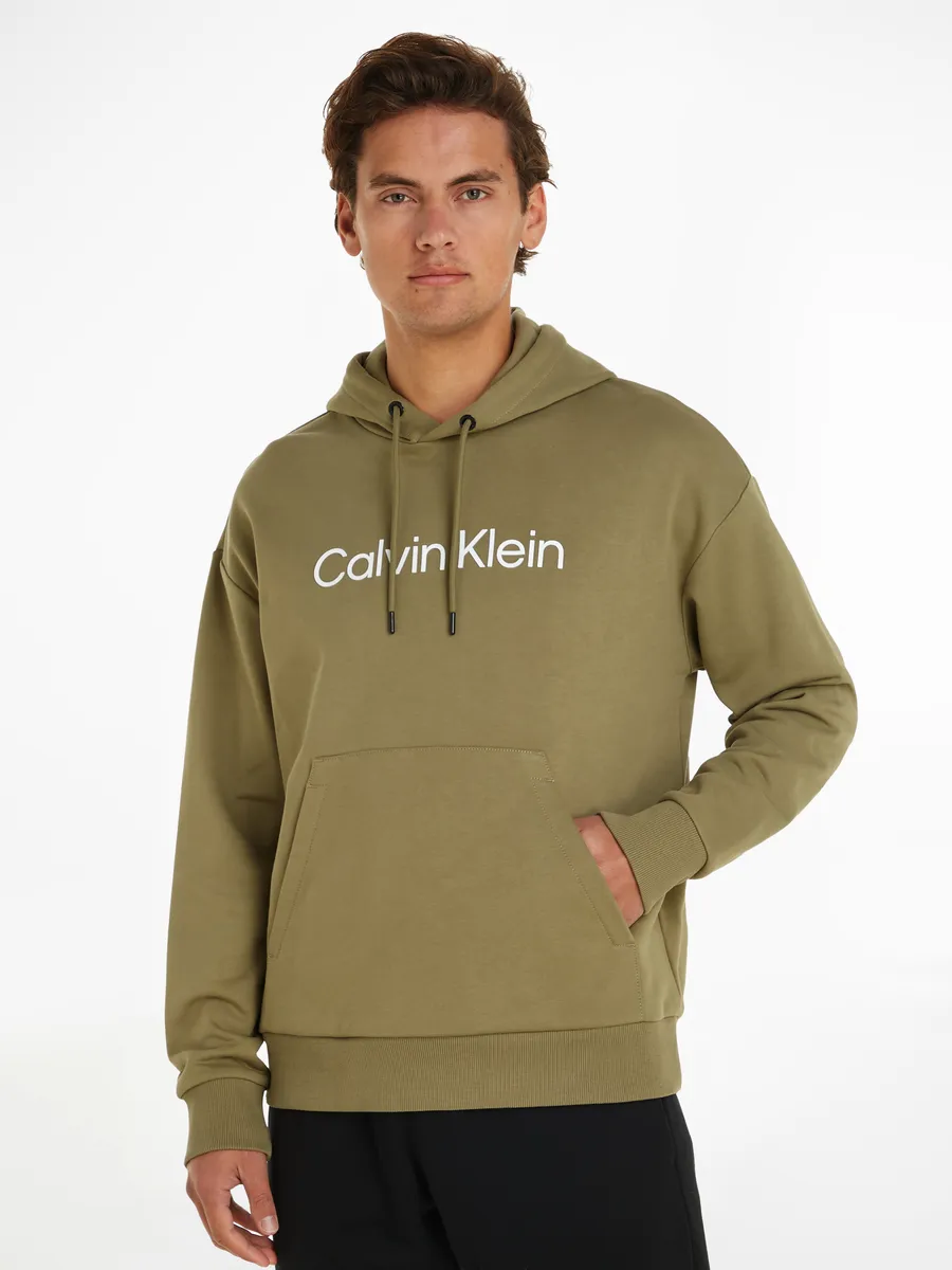 

Толстовка Calvin Klein с капюшоном "HERO LOGO COMFORT HOODIE" и надписью-логотипом, цвет Delta Green