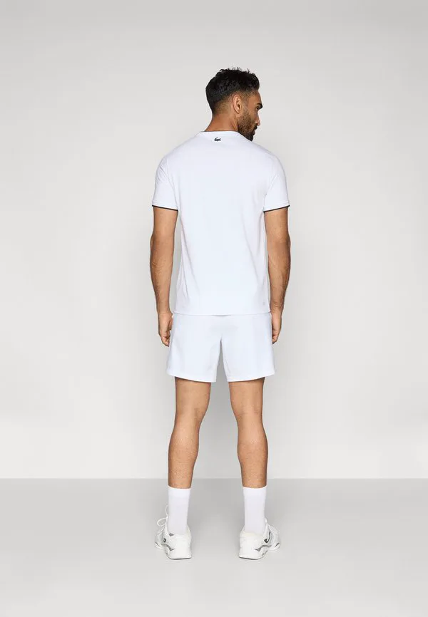 Короткие спортивные шорты в классическом стиле Lacoste Sport, White — фото 3