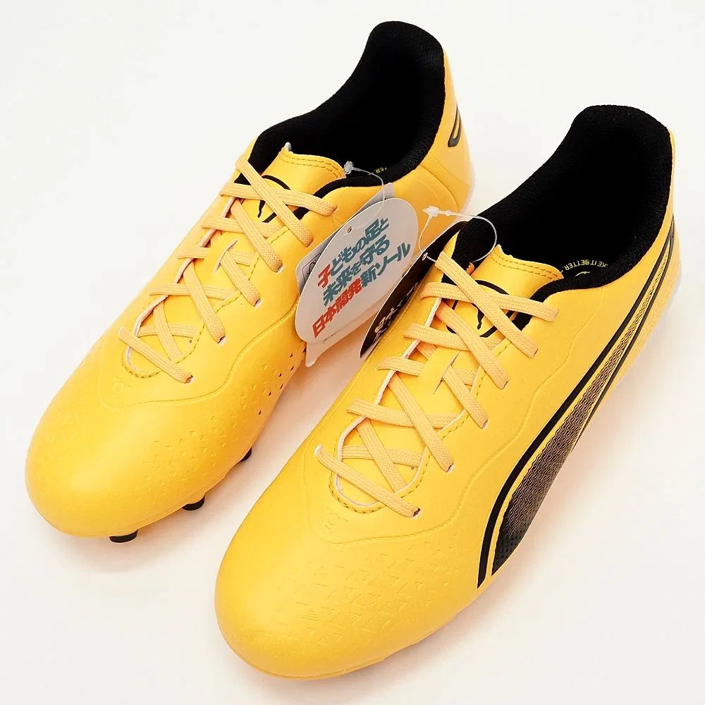 Детские футбольные бутсы Puma King Match HG+MID JR, желтый/черный, размер 24.0cm - 37 RU