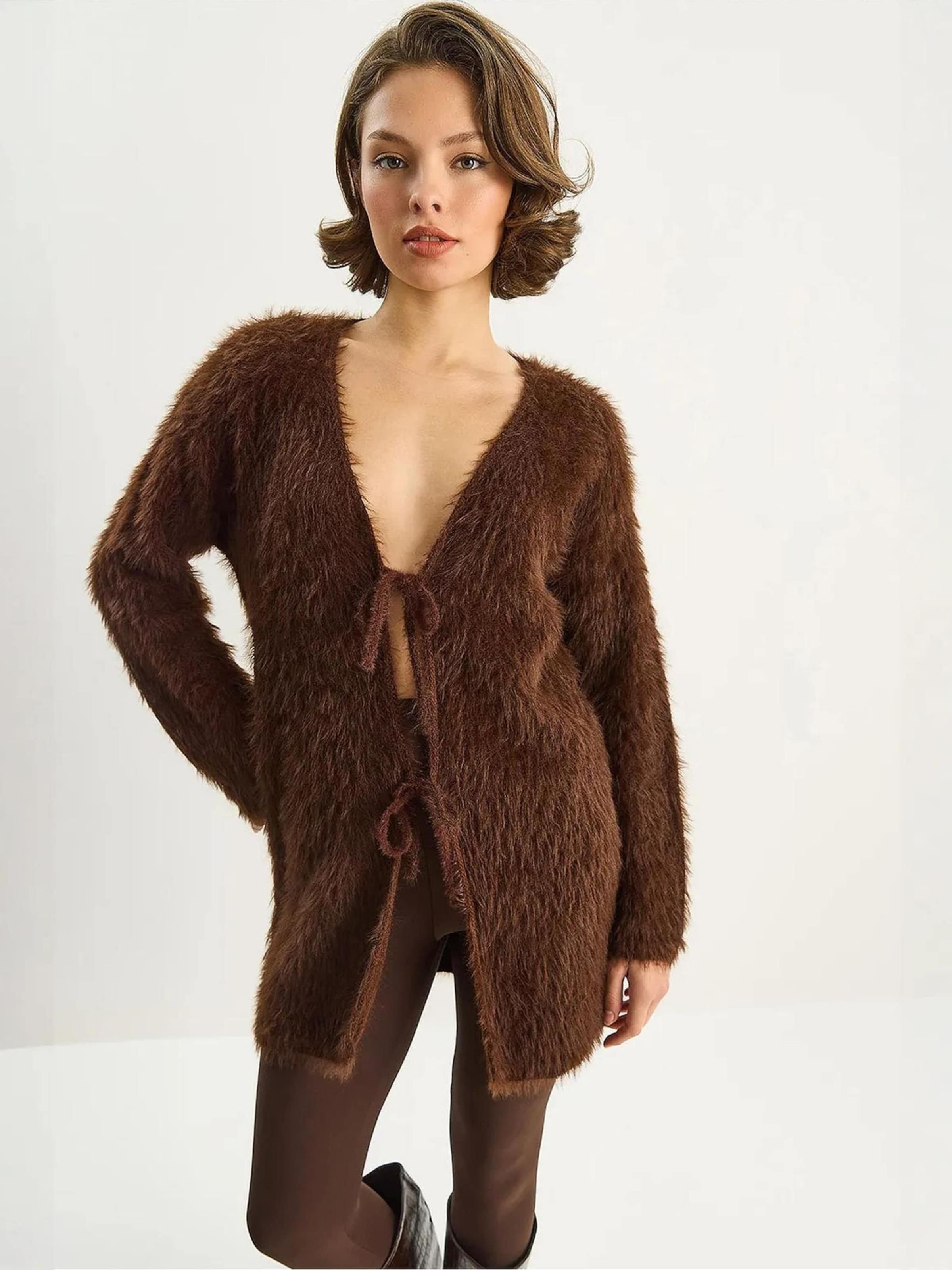 

Bianco Lucci Вязаный кардиган в коричневом цвете