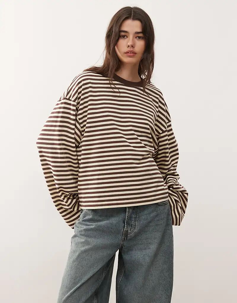 

Лонгслив свободного кроя Lioness Bloom из хлопковой смеси с длинными рукавами и круглым вырезом в шоколадно-лимонную полоску