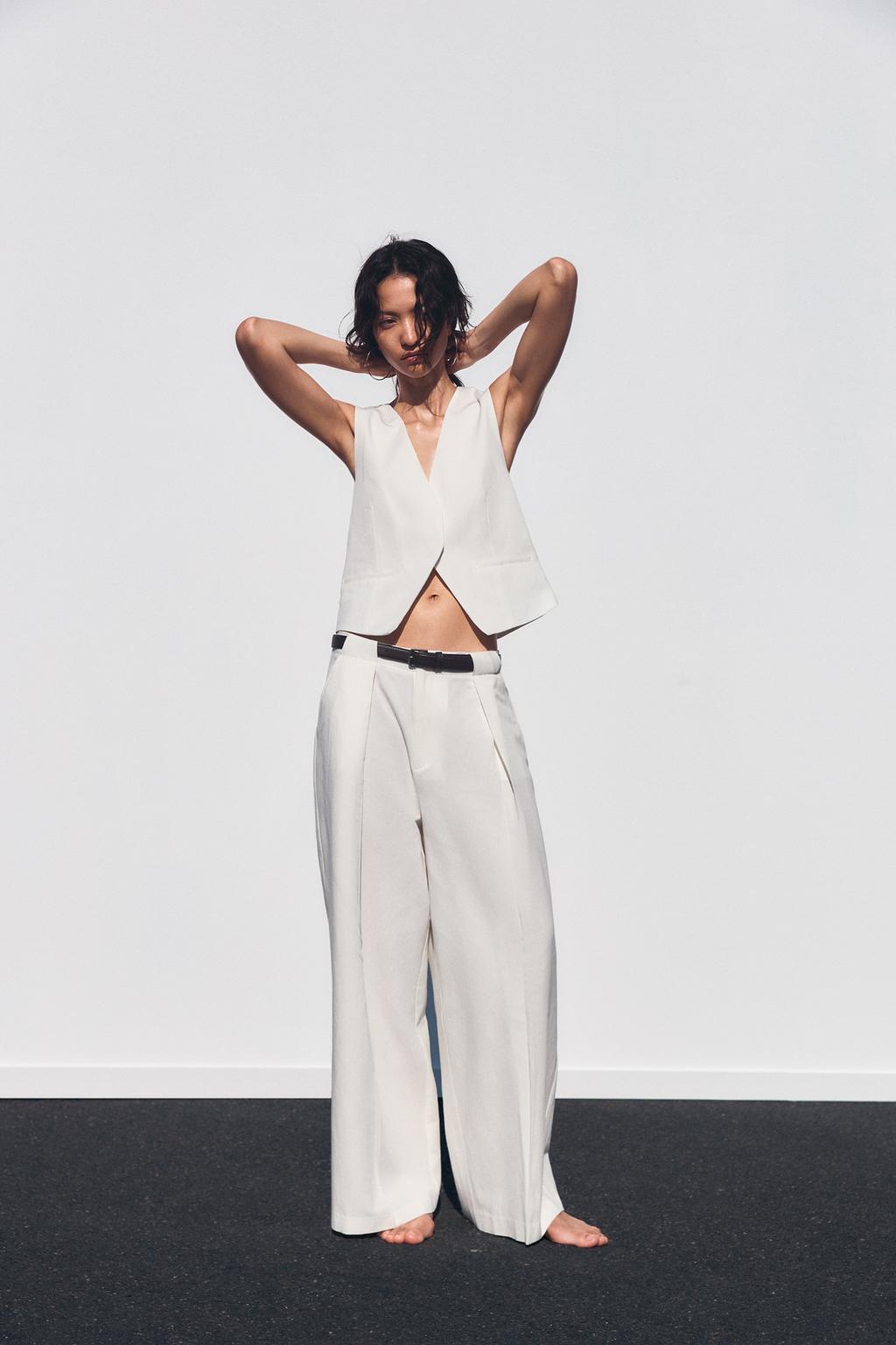 

Жилет с прорезным карманом ZARA, экрю
