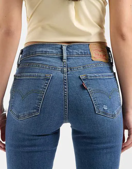 Темно-синие джинсы суперскинни с рваными краями Levi's 710 — фото 4